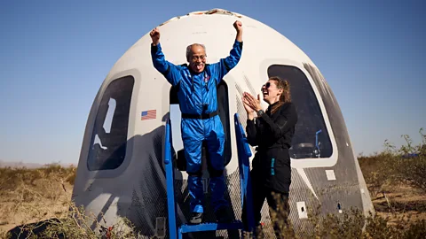 Blue Origin Ed Dwight (left) exiting the Blue Origin capsule (Credit: Blue Origin)