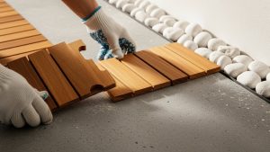 Installing deck tiles is one of the best small balcony makeover ideas on a budget.