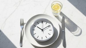 Establishing a consistent eating window is crucial for Intermittent Fasting 16/8 success.