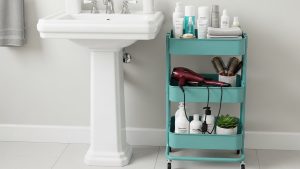 Rolling carts are versatile tools for mastering tiny bathroom organization hacks.
