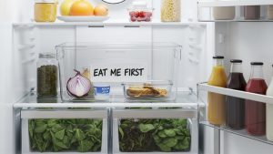 Using an 'Eat Me First' box is a practical hack for how to reduce food waste.
