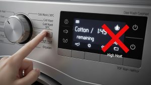 Adjusting machine settings is a free way to learn how to stop microplastics in laundry.