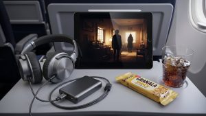 Preparing offline entertainment is a key strategy for how to survive long-haul flights in economy.